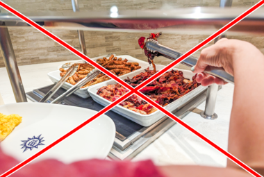 woman grabbing bacon at a buffet